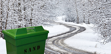 Winding Winter Road With Slushy Conditions