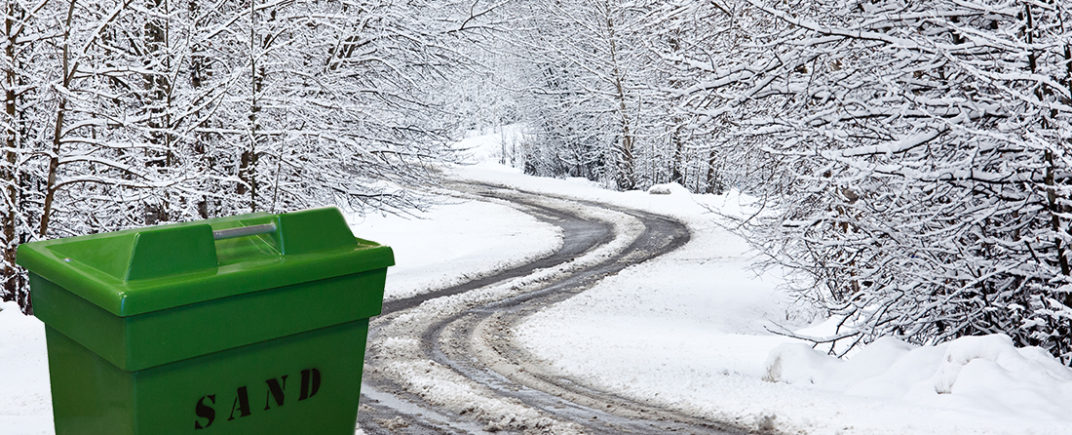 Winding Winter Road With Slushy Conditions